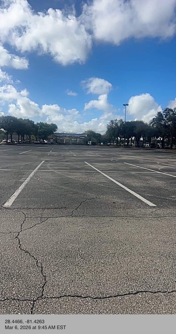 Wide commercial parking lot property cleanup assessment Central Florida